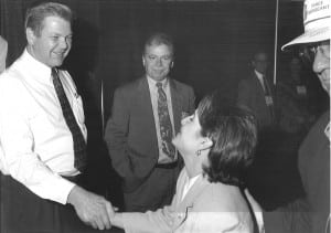 James O. Baker, NRECA President (left) and Martin Lowery, NRECA staff greet members during NRECA’s 1997 annual meeting. (Photo By: NRECA)
